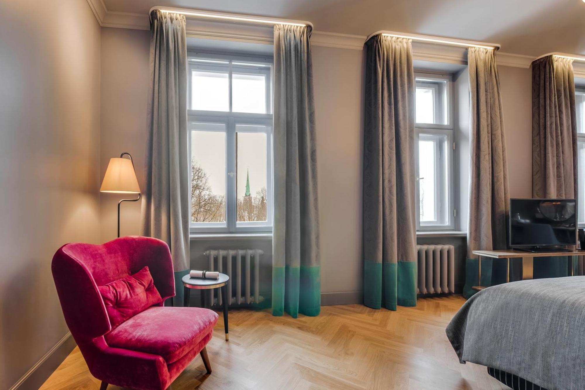 Grand Poet Hotel And Spa By Semarah Riga Exterior foto A room at the hotel